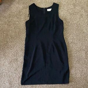 Solid black dress, goes to my knees and I’m 5’6”